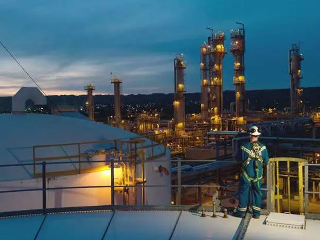 Energy refinery towers at night
