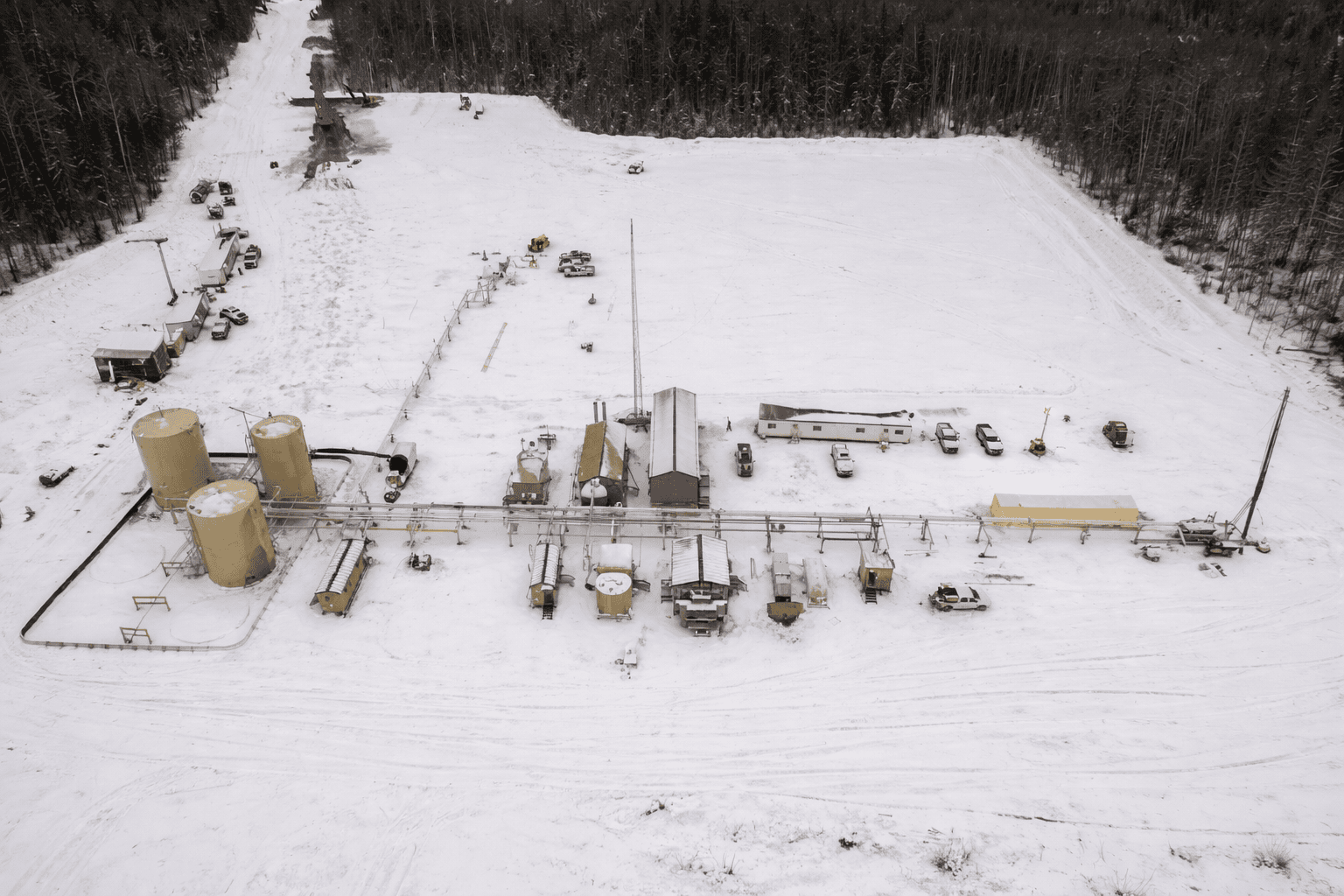 Aerial view of energy facility in snowy field